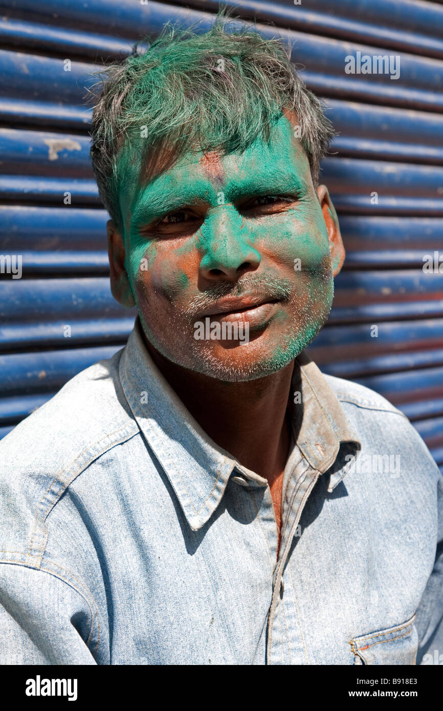 Bihari man daubed in green paint, part of the Holi celebrations in Almora, India. Stock Photo