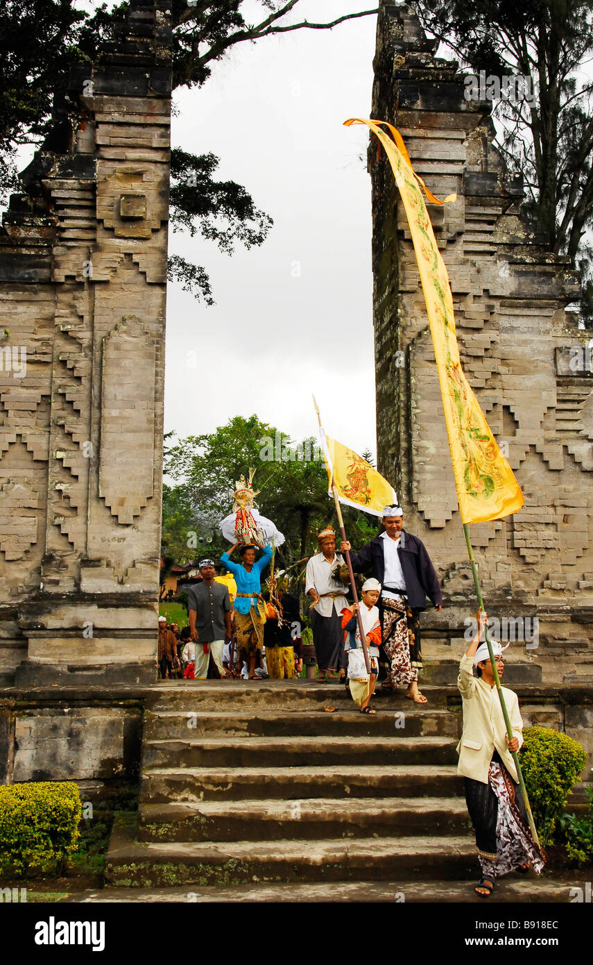The parade of Balinese folks taking bone ash to the lake at Danau Bratan,Bali,Indonesia. Stock Photo