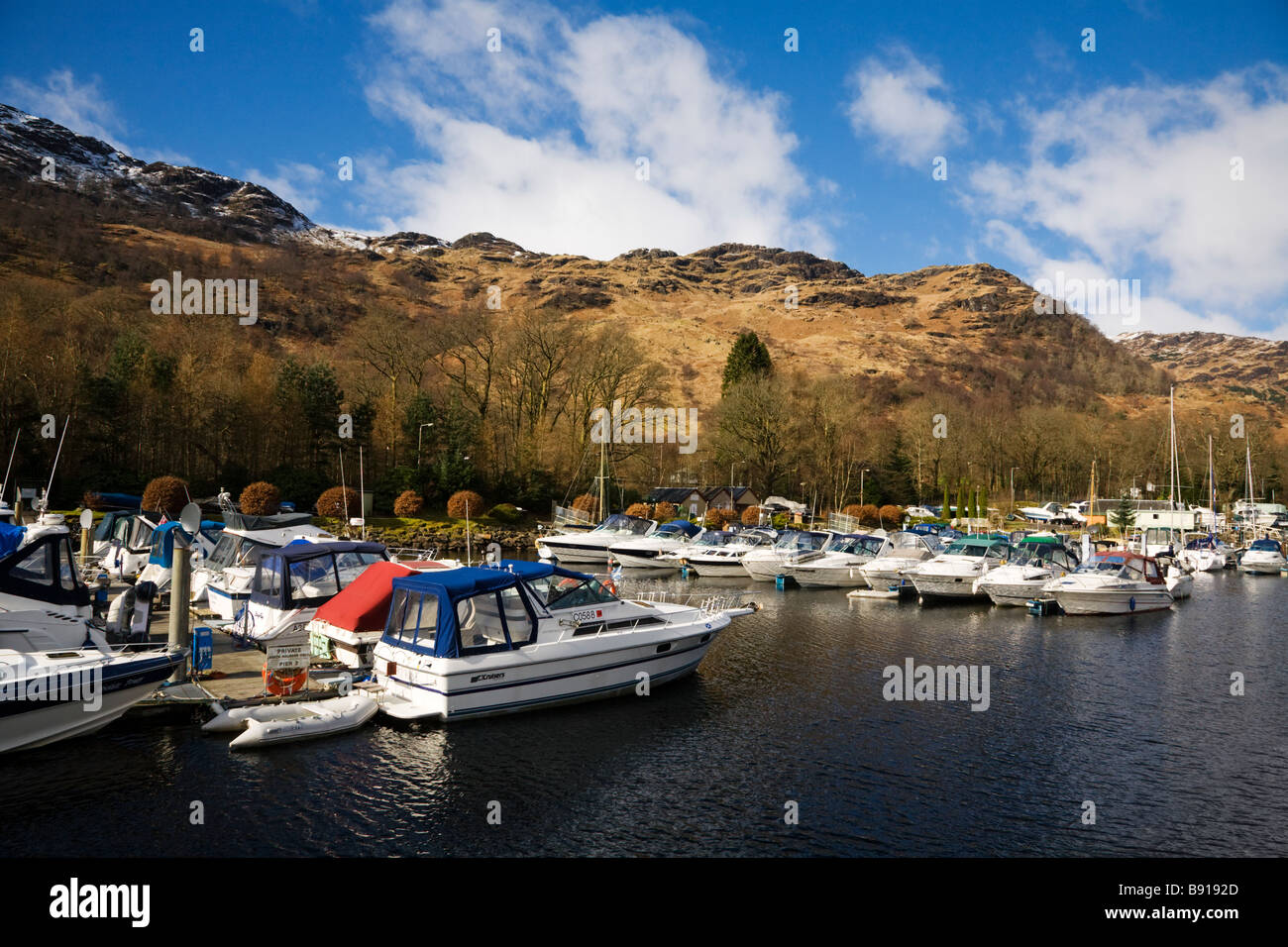 Boats moored at Ardlui marina, Loch Lomond, Stirlingshire, Scotland. Stock Photo