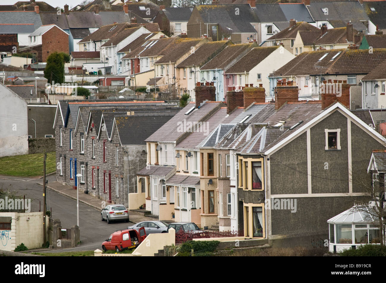 Rows of terraced houses in Milford Haven Pembrokeshire Wales UK Stock Photo