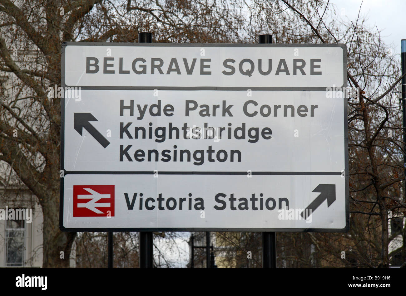 A road direction sign in Belgrave Square, London. Mar 2009 Stock Photo
