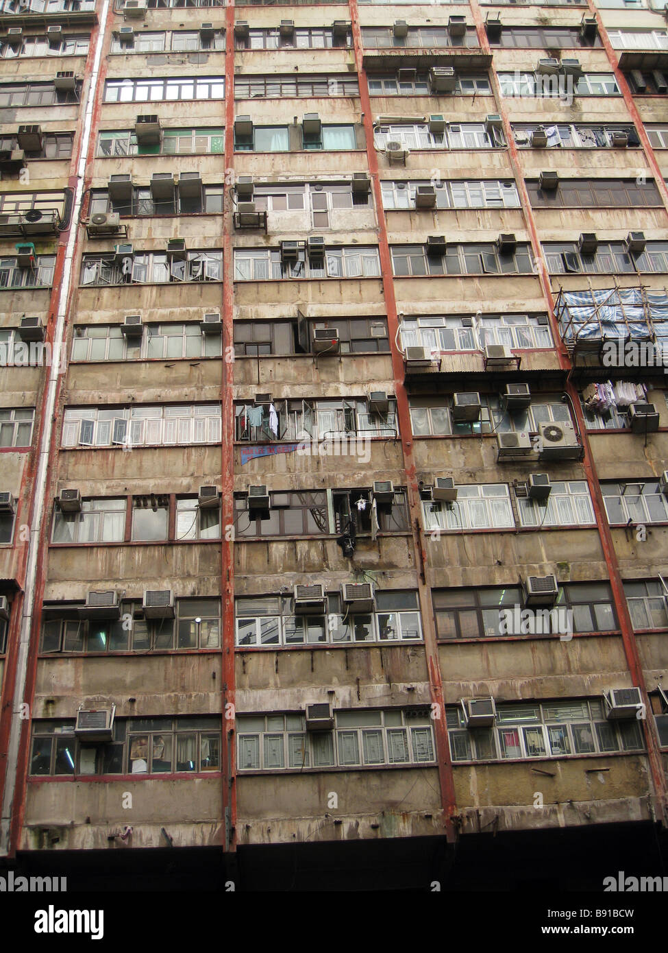 Air-condition units on side of tenement block in Nathan Road Stock Photo