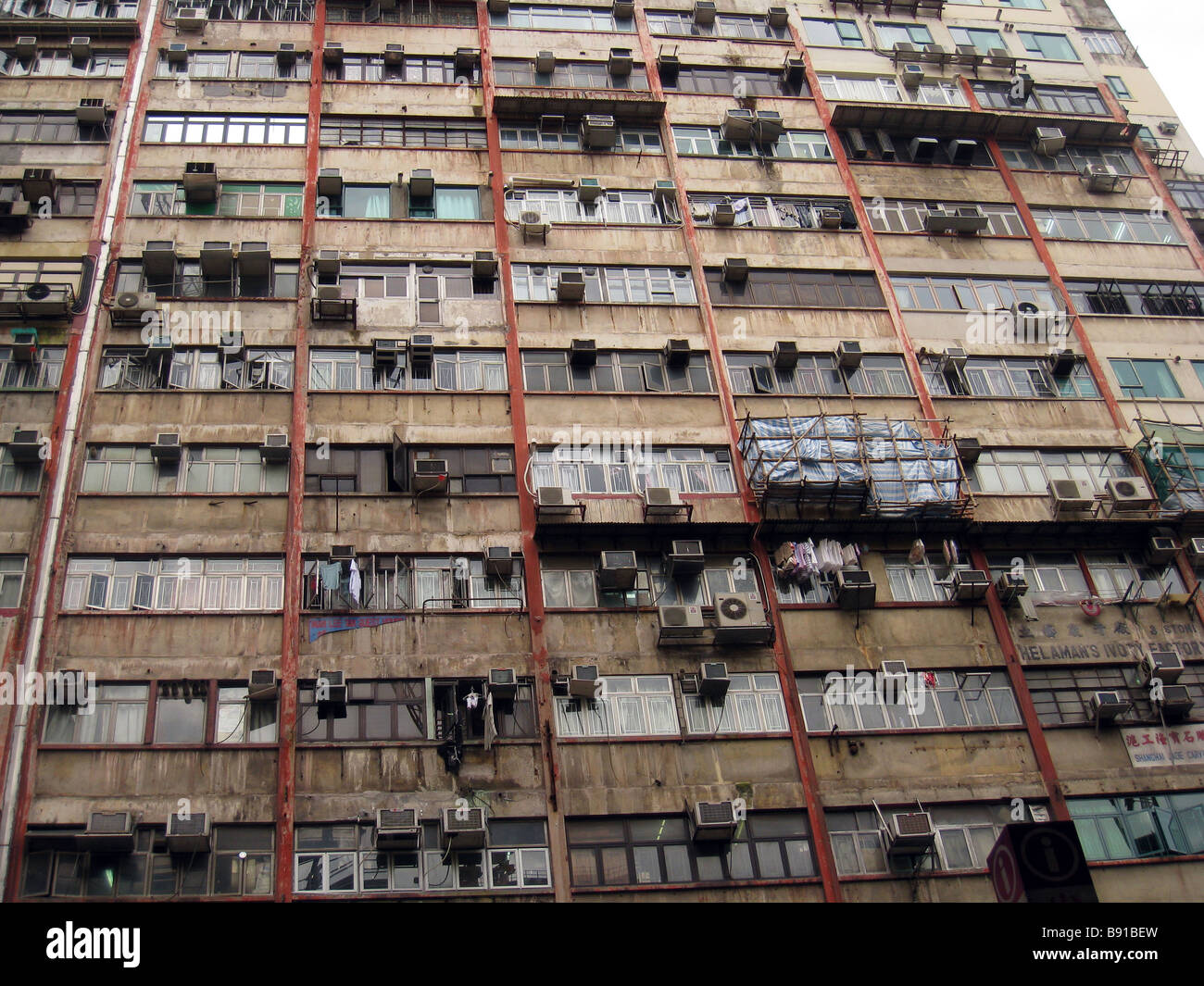 Air-conditioning units on the side of tenement blocks on Nathan Road Stock Photo