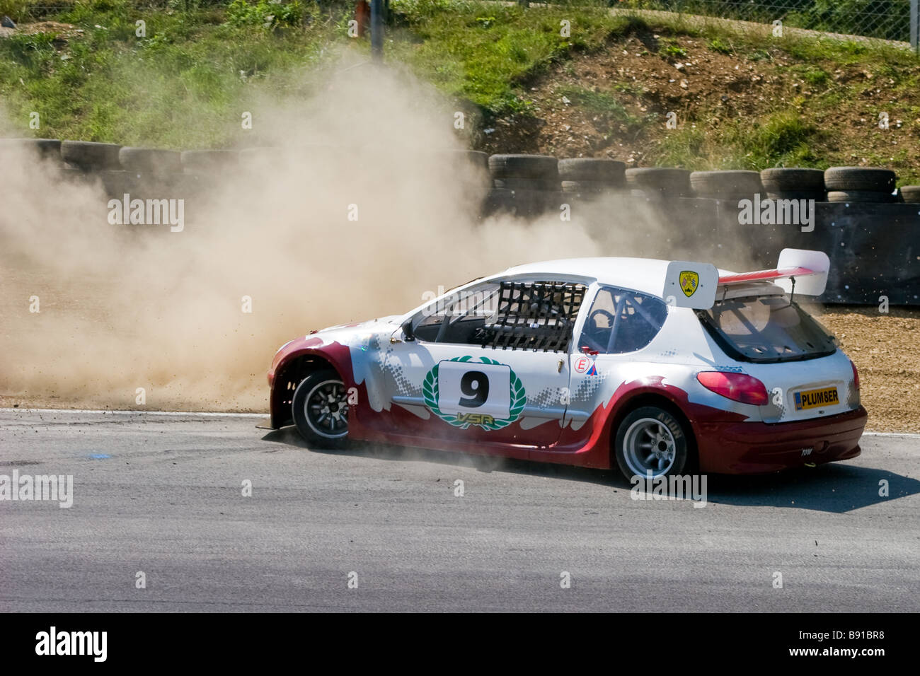 Car spinning off the track at Brand's Hatch Kent Stock Photo