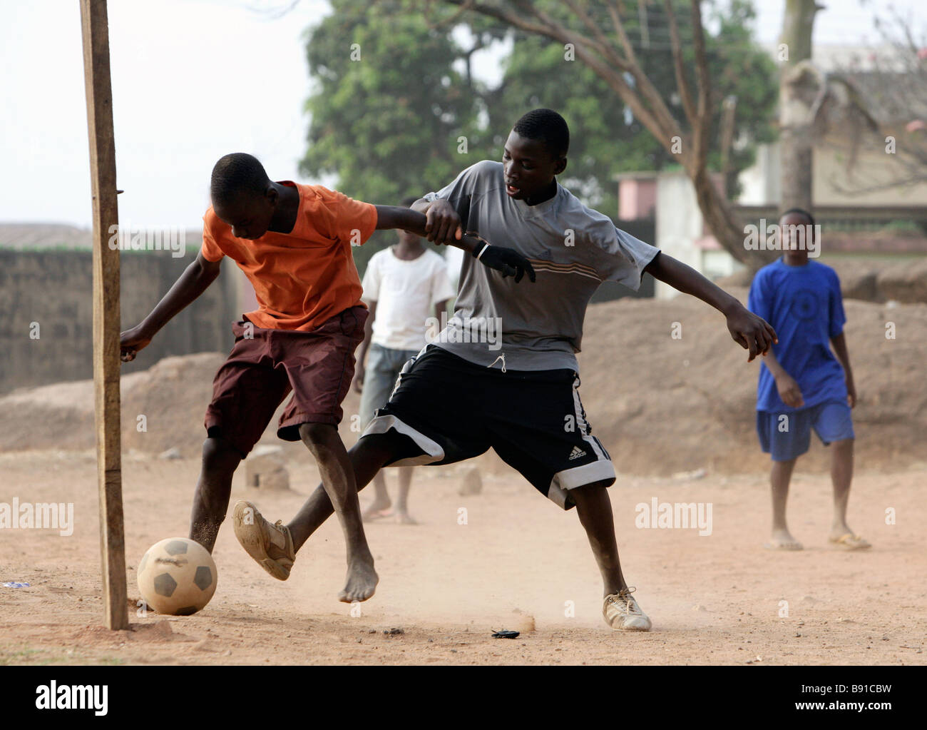 Nigeria: young boys play football, soccer Stock Photo