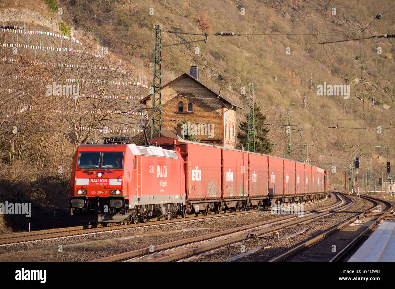 Railion DB Logistics class 185 electric locomotive No 185 304-3 hauling a freight train near Kaub Stock Photo