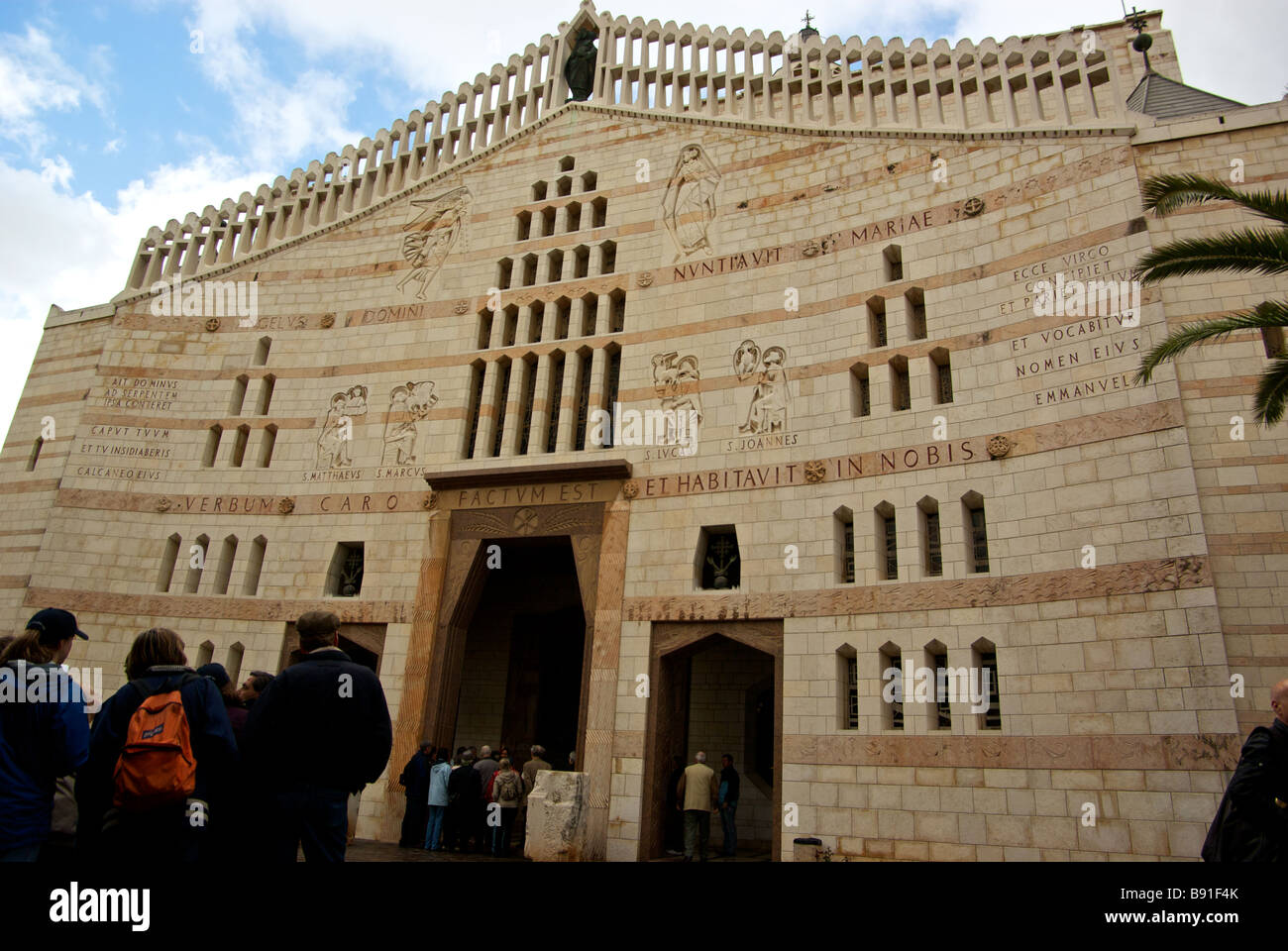 Pilgrims wait to enter Basilica of the Annunciation the largest Middle East Roman Catholic church built in 1966 Stock Photo