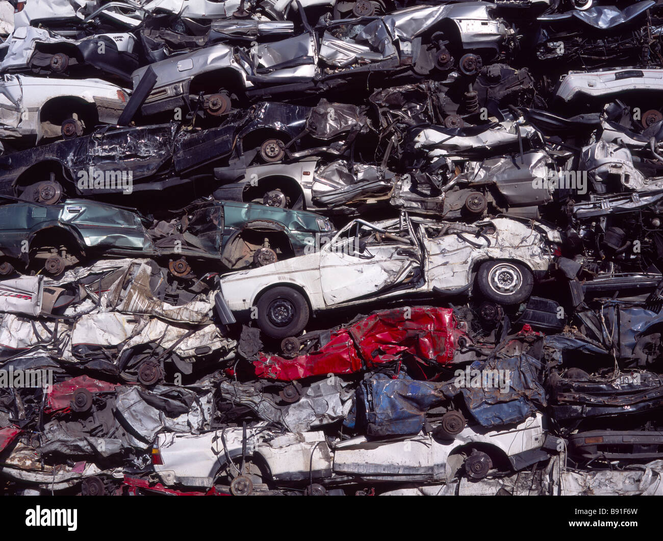a hill of stapled car wrecks on a wrecking yard Stock Photo Alamy