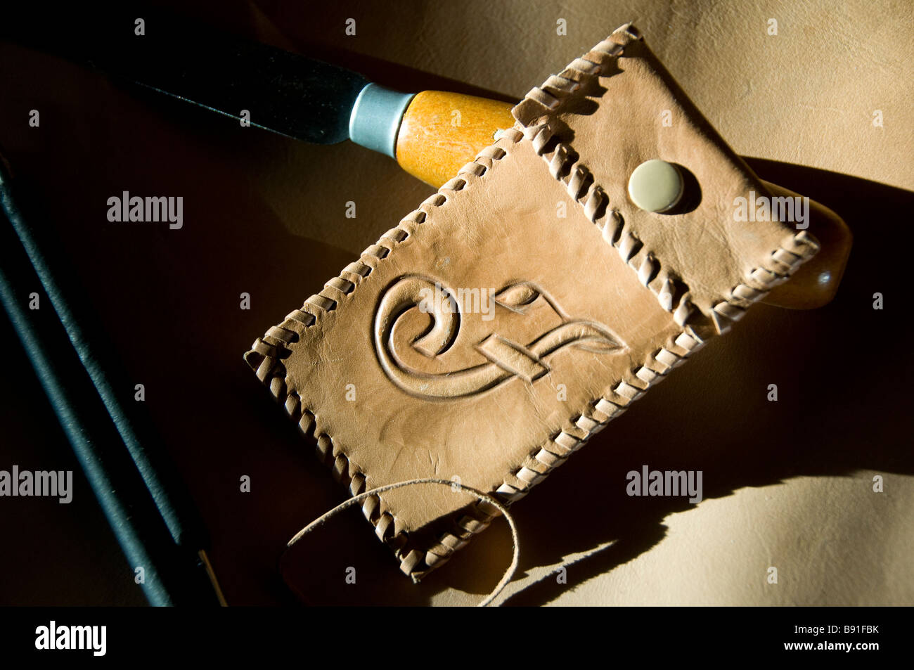 Leather wallet and tools Stock Photo Alamy