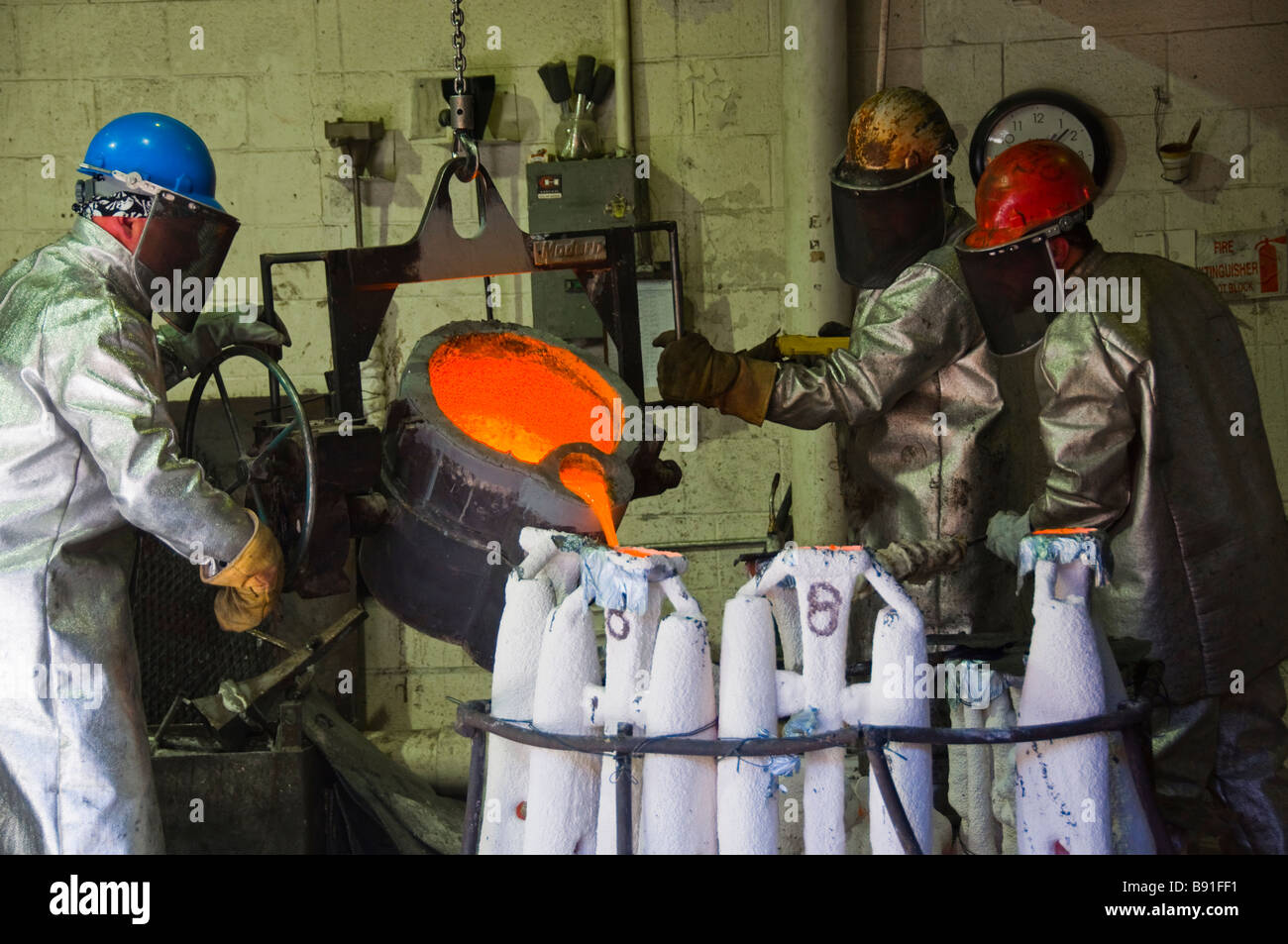Workers at Shidoni bronze art foundry in Santa Fe New Mexico Stock