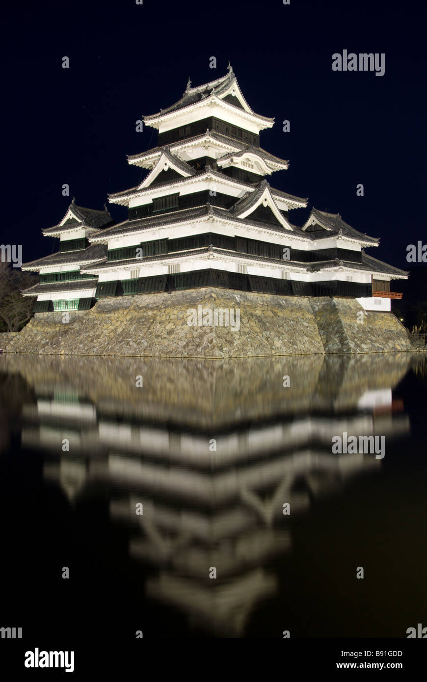 Matsumoto castle by night against a dark sky Stock Photo