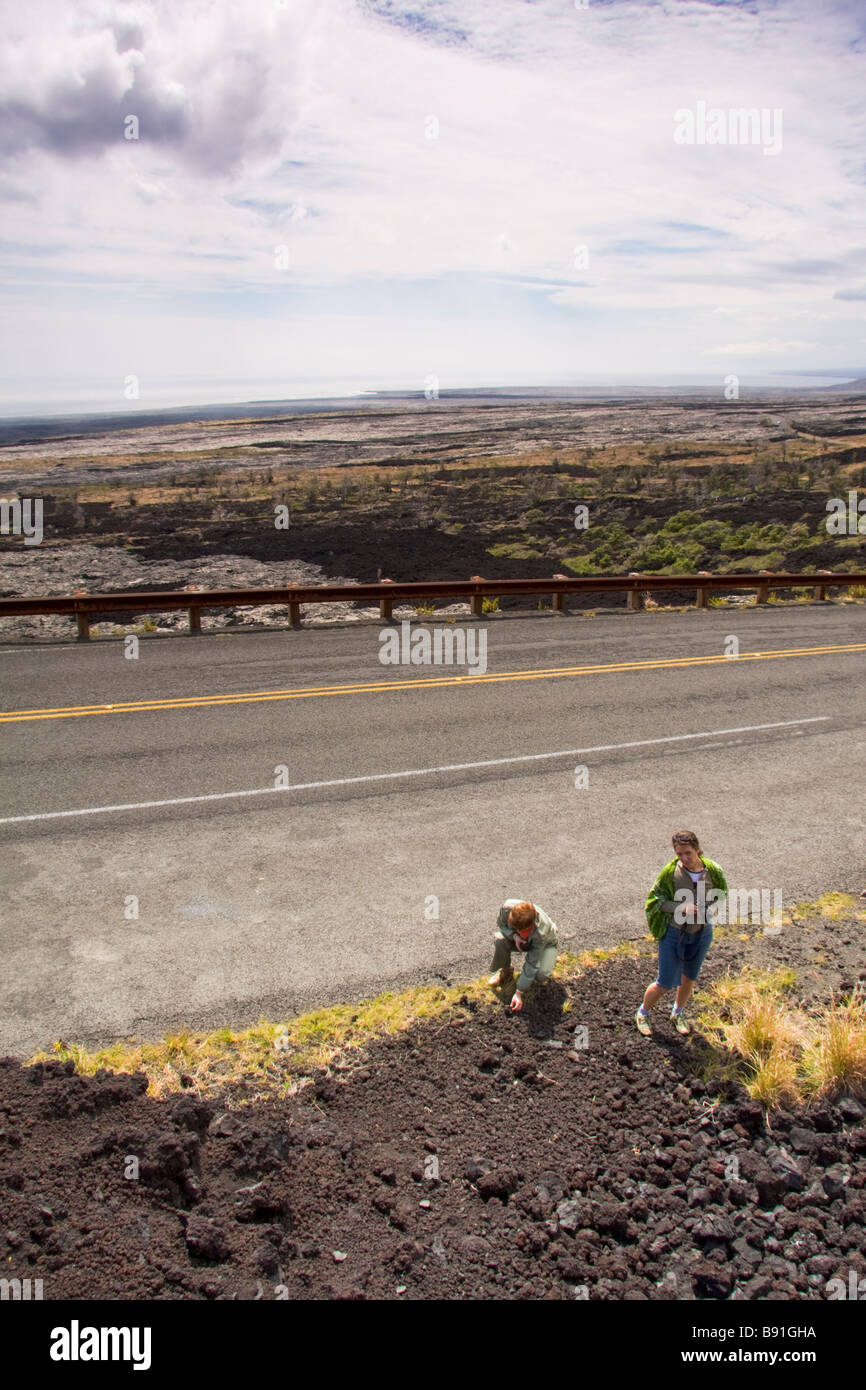 Visitors viewing lava flow near Chain of Craters Road, Big Island, Hawaii, USA Stock Photo