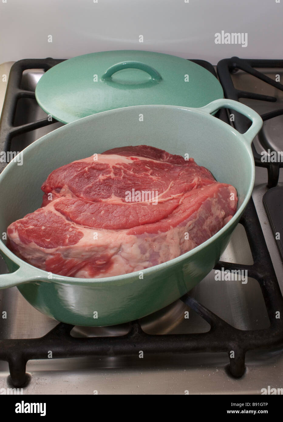 Pot roast in a pot ready for the oven Stock Photo Alamy