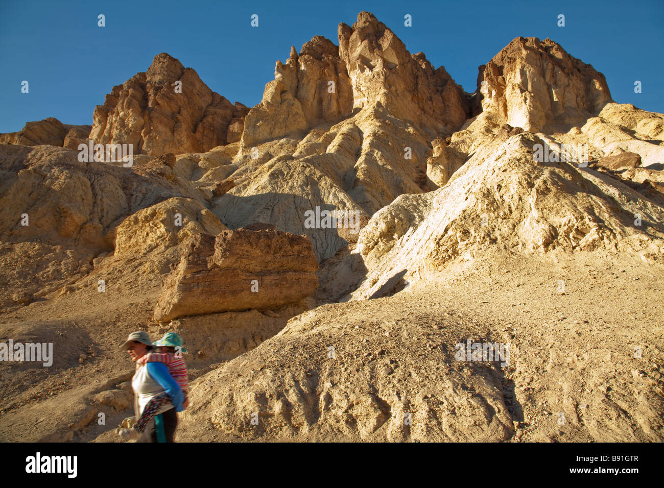People hiking in Death Valley National Park Stock Photo - Alamy
