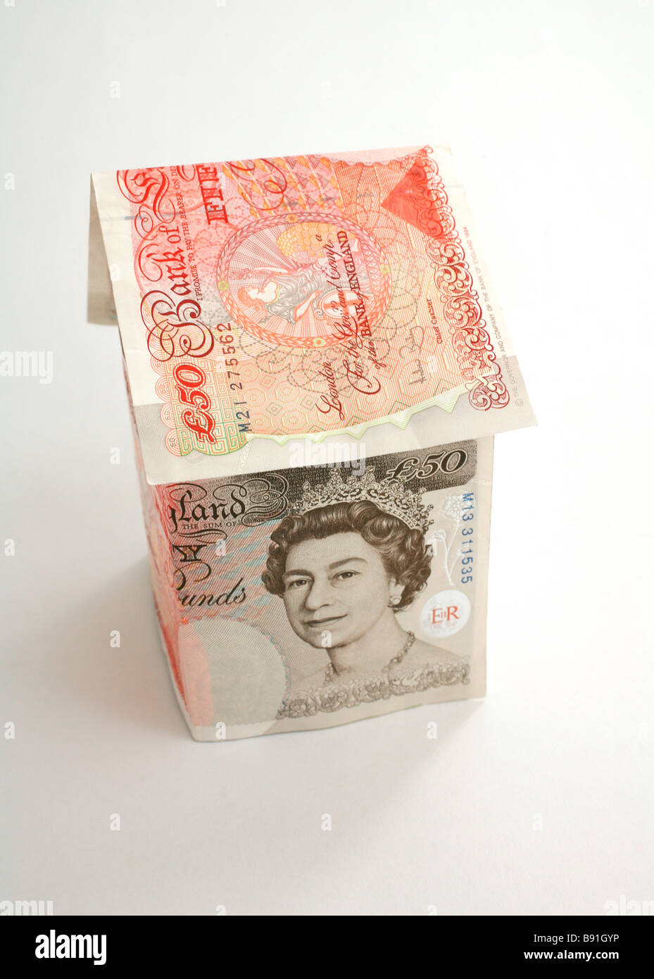 Uk pound note and house hi-res stock photography and images - Alamy