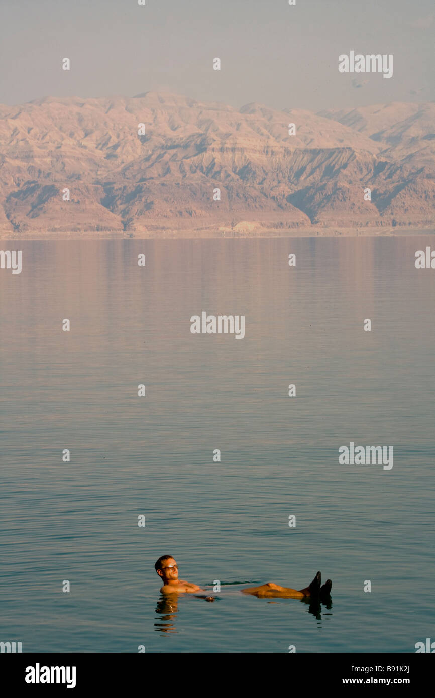 Male tourist floating in Dead Sea, Israel, Middle East Stock Photo