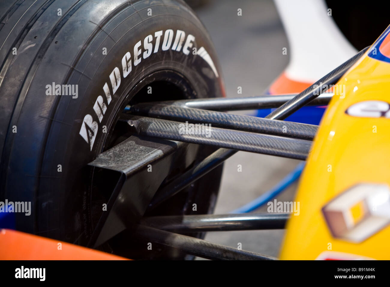 Formula one tire change Stock Photo Alamy