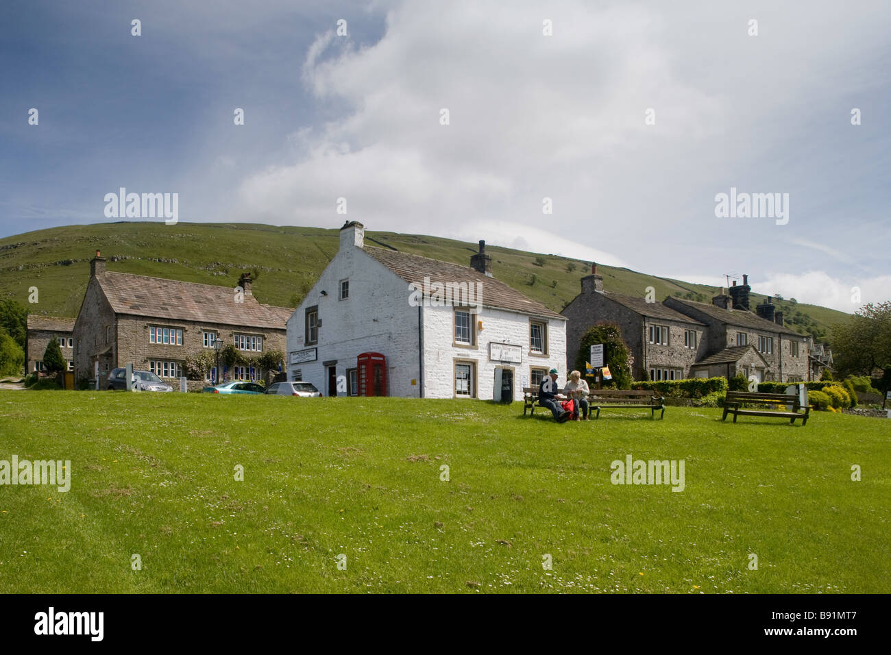 Walkers in Buckden village, North Yorkshire, enjoy their picnic on the
