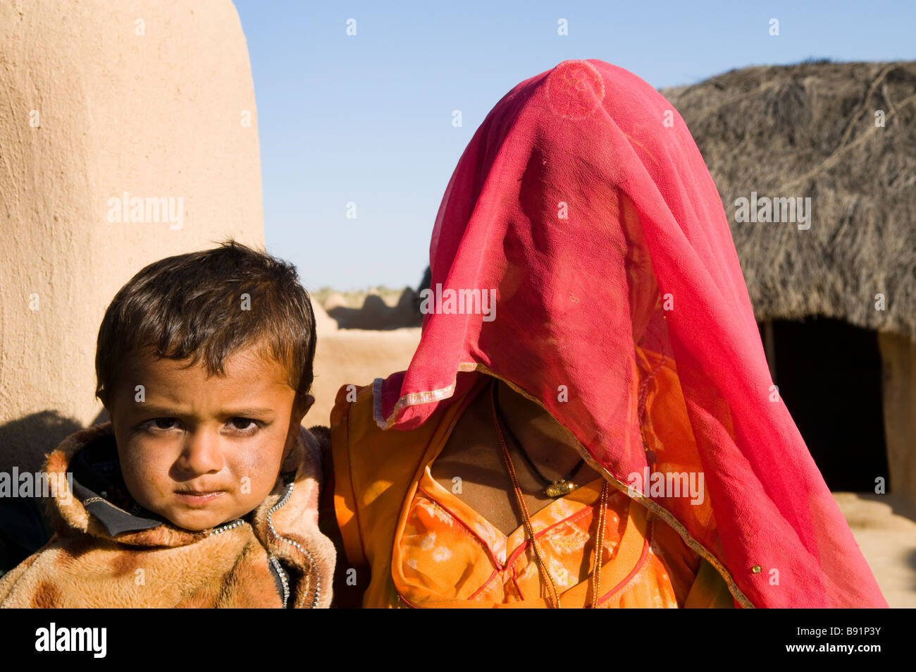 Mother and her child. portrait taken in their beautiful village located ...