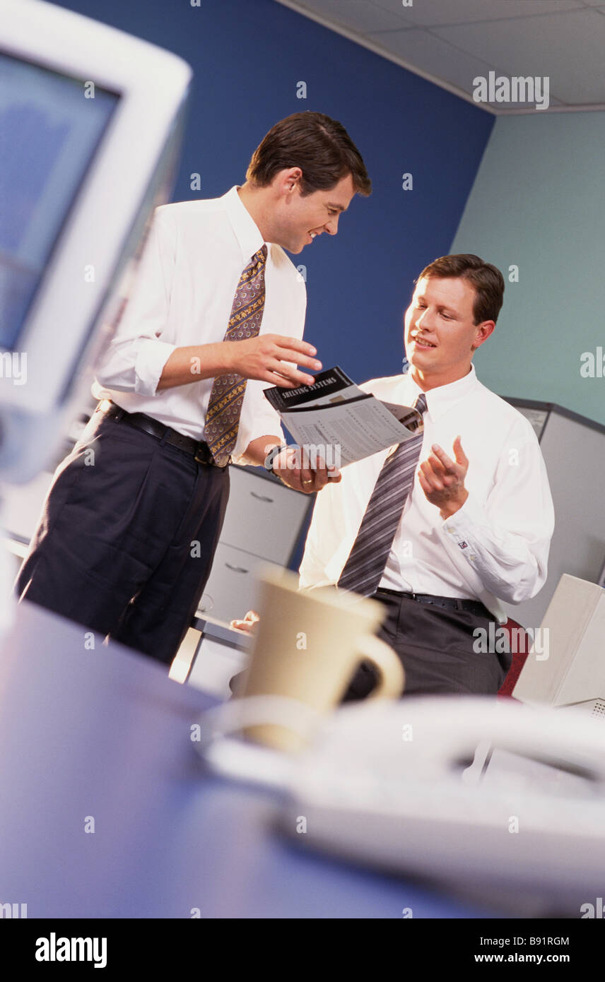 Businessmen having office meeting Stock Photo