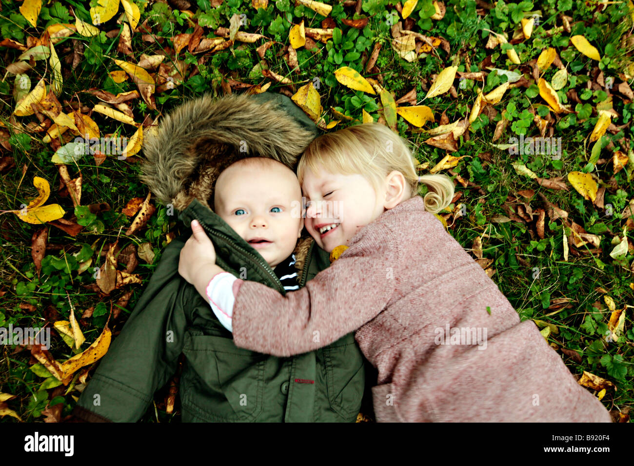 A sister with her baby brother Sweden. Stock Photo