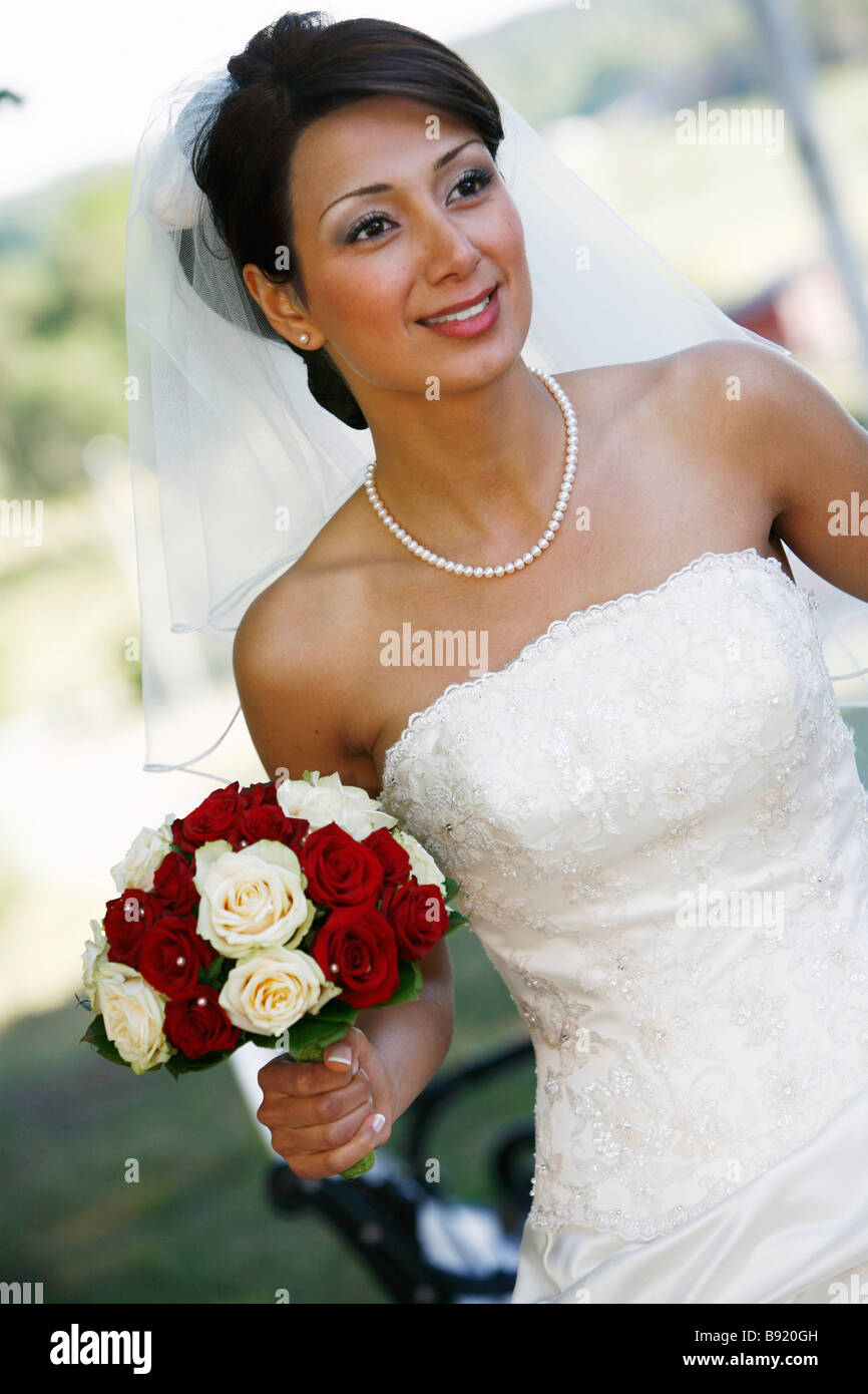 A bride holding her wedding bouquet Sweden. Stock Photo