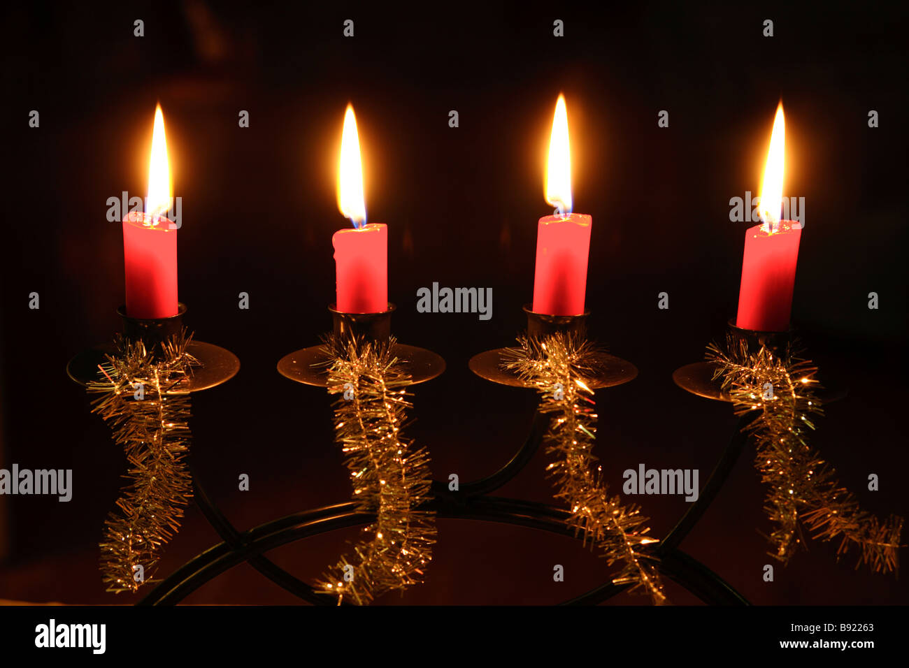 Advent candlestick with four candles lit in turn on each Sunday in Advent Sweden Stock Photo Alamy