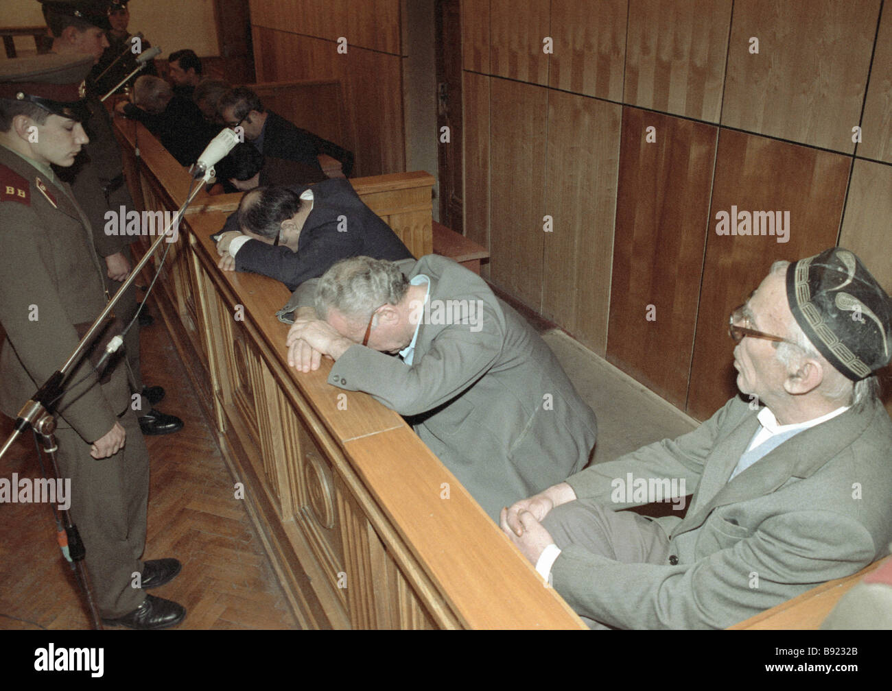 Deposed police officers in the dock Stock Photo - Alamy