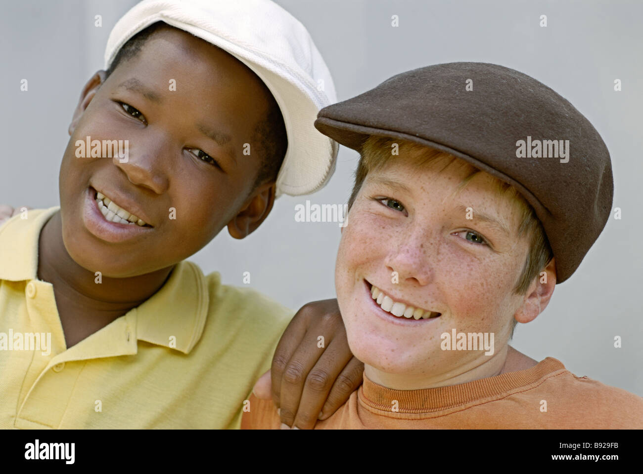Teenage boys with caps Cape Town Western Cape South Africa Stock Photo