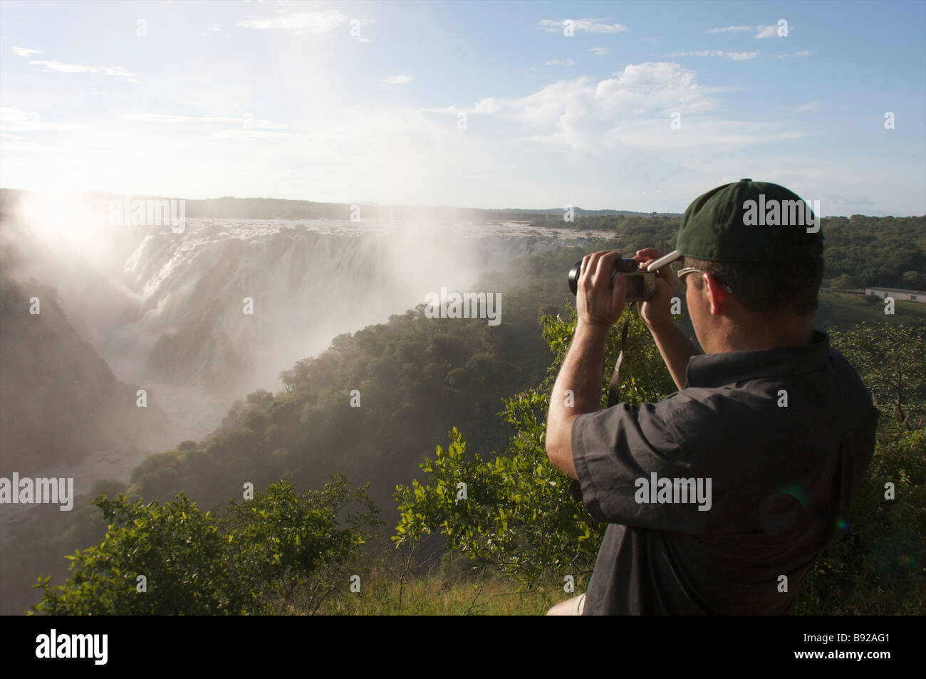 Man admiring falls Ruacana Falls Kunene River Kaokoland Namibia Stock Photo