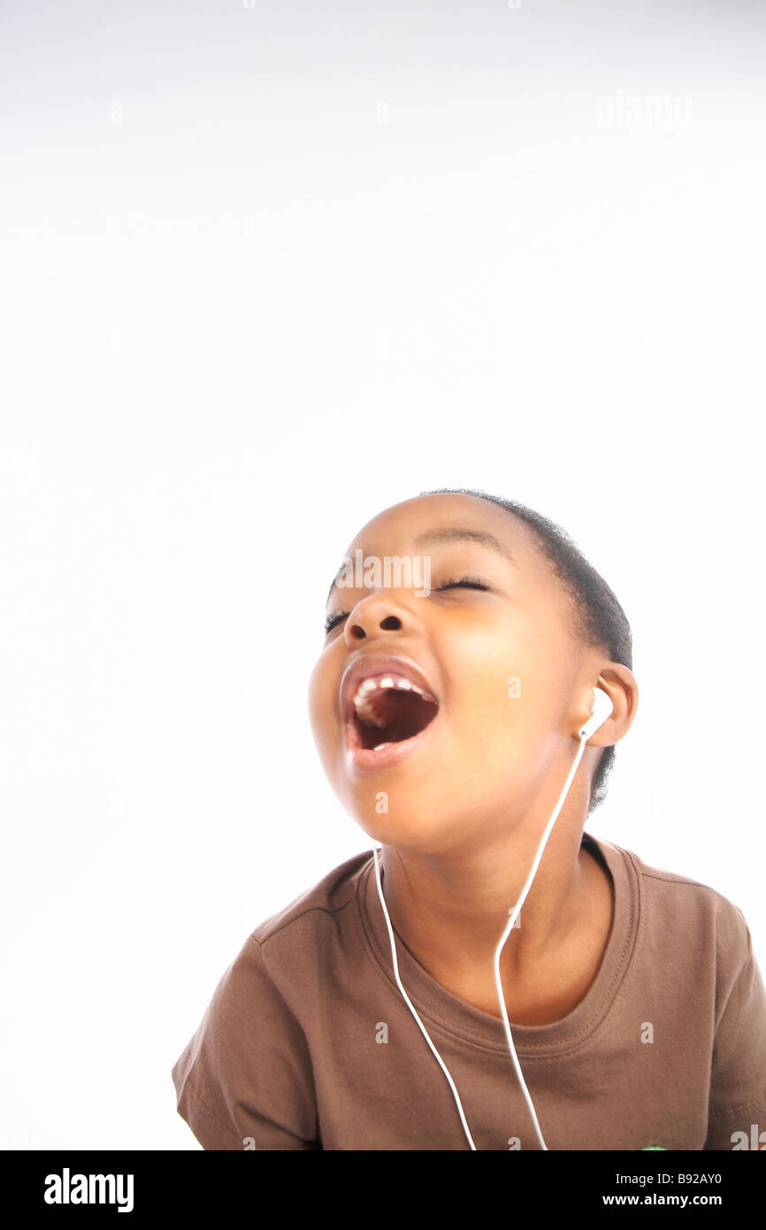 Young girl singing with eyes closed Stock Photo Alamy