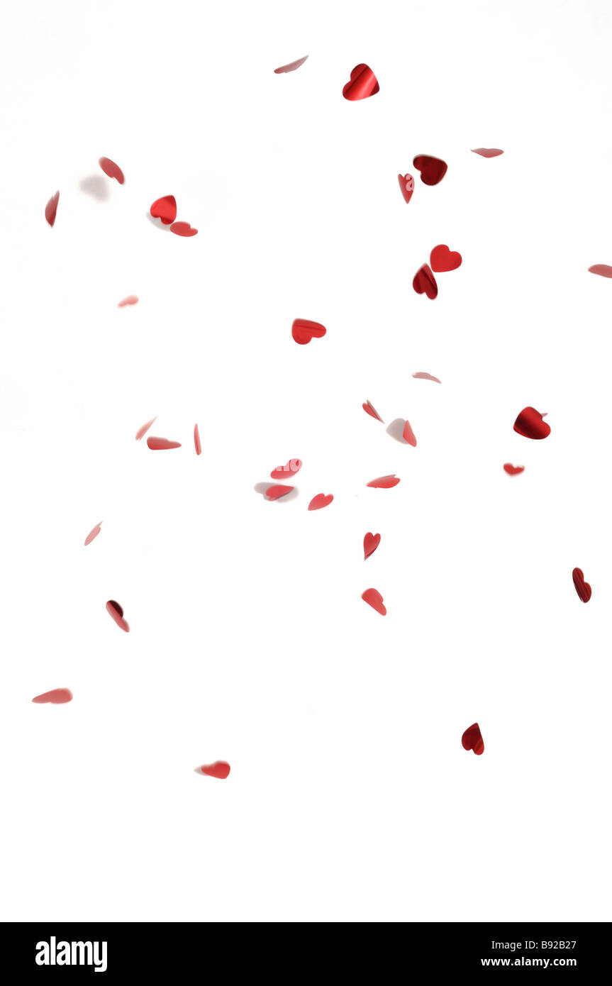 Falling confetti hearts on a white background Stock Photo