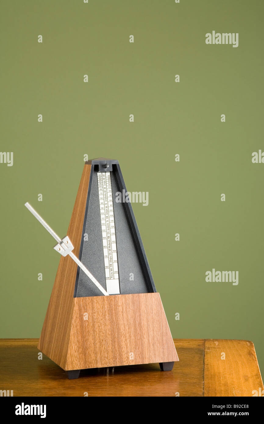 Metronome on a table Stock Photo