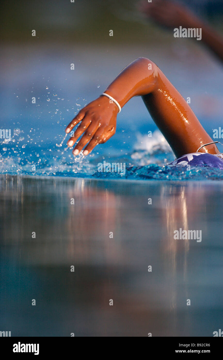 View of swimmers arm coming out of water Stock Photo Alamy
