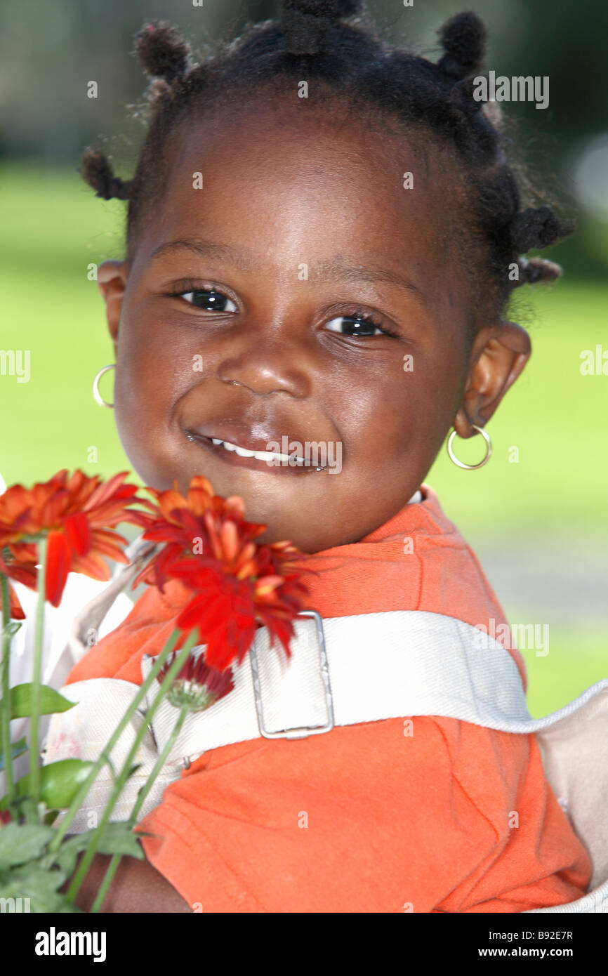Baby girl holding flowers Dewaal Park Cape Town Western Cape Province