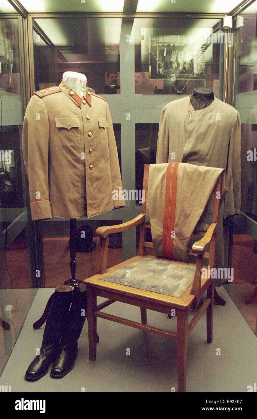 Josef Stalin s tunic trousers boots and summer coat exhibited at an  exposition on the 50th anniversary of his death Stock Photo - Alamy
