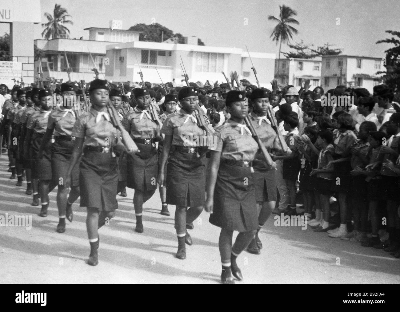Tanzanian girls with rifles from the Youth League Stock Photo Alamy
