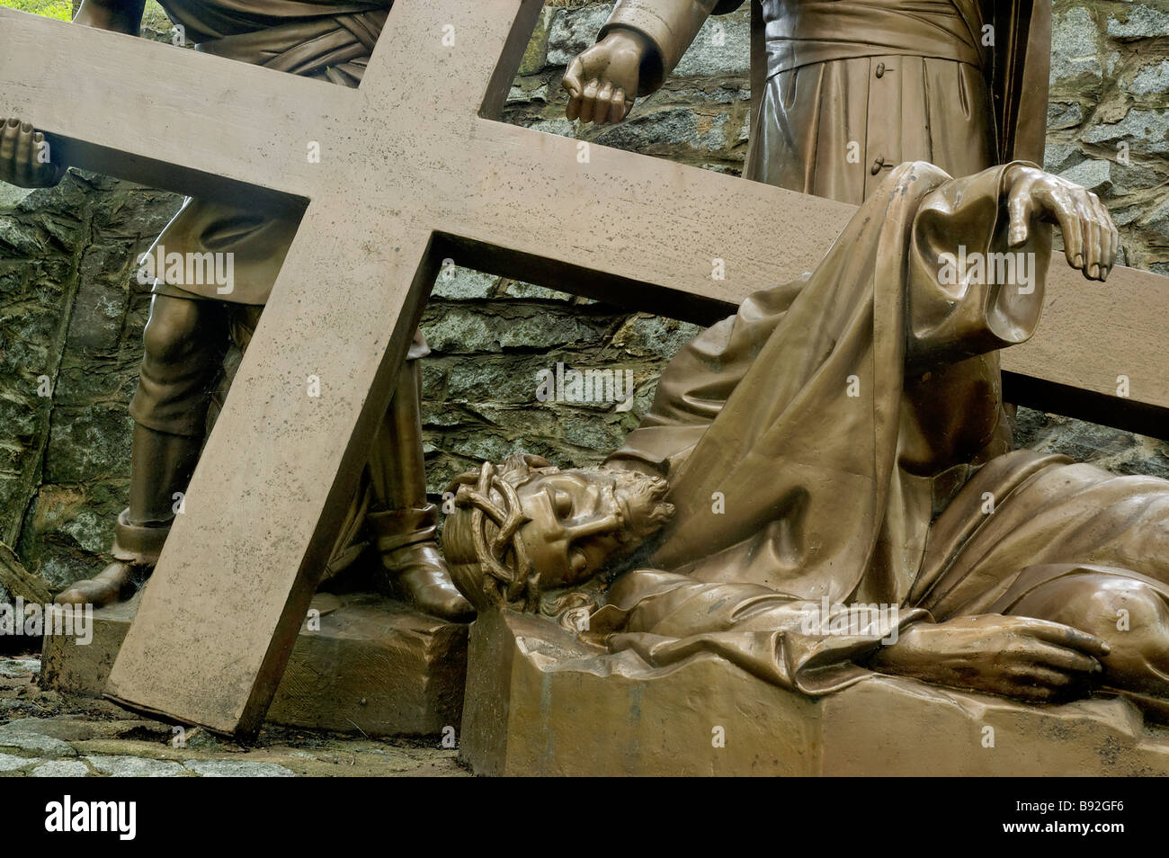 Jesus falls for the third time from the Stations of the Cross Stock Photo