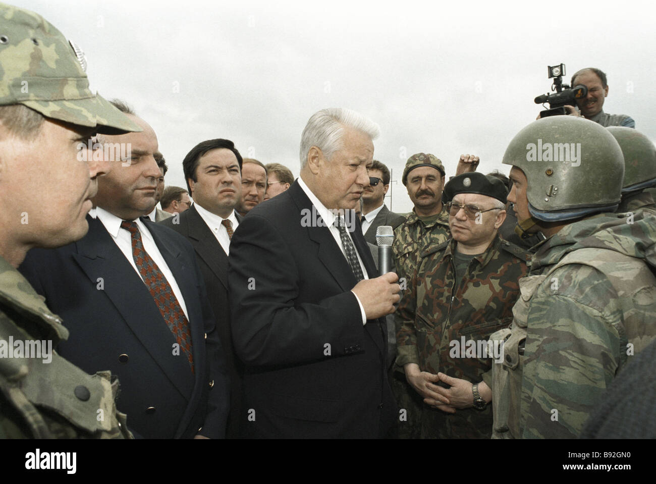 Russian President Boris Yeltsin center addresses soldiers of the 205th