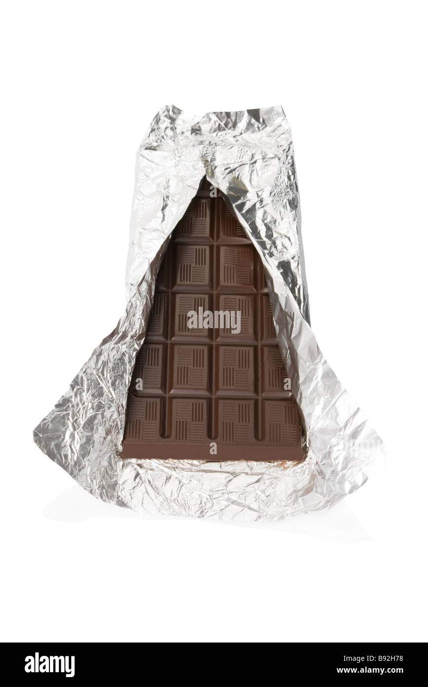 Dark chocolate bar inside wrapping foil isolated on white background