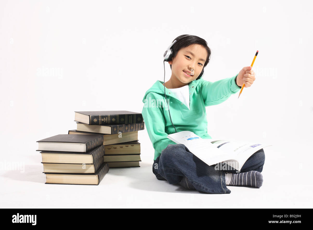 Young Child in Study Stock Photo - Alamy