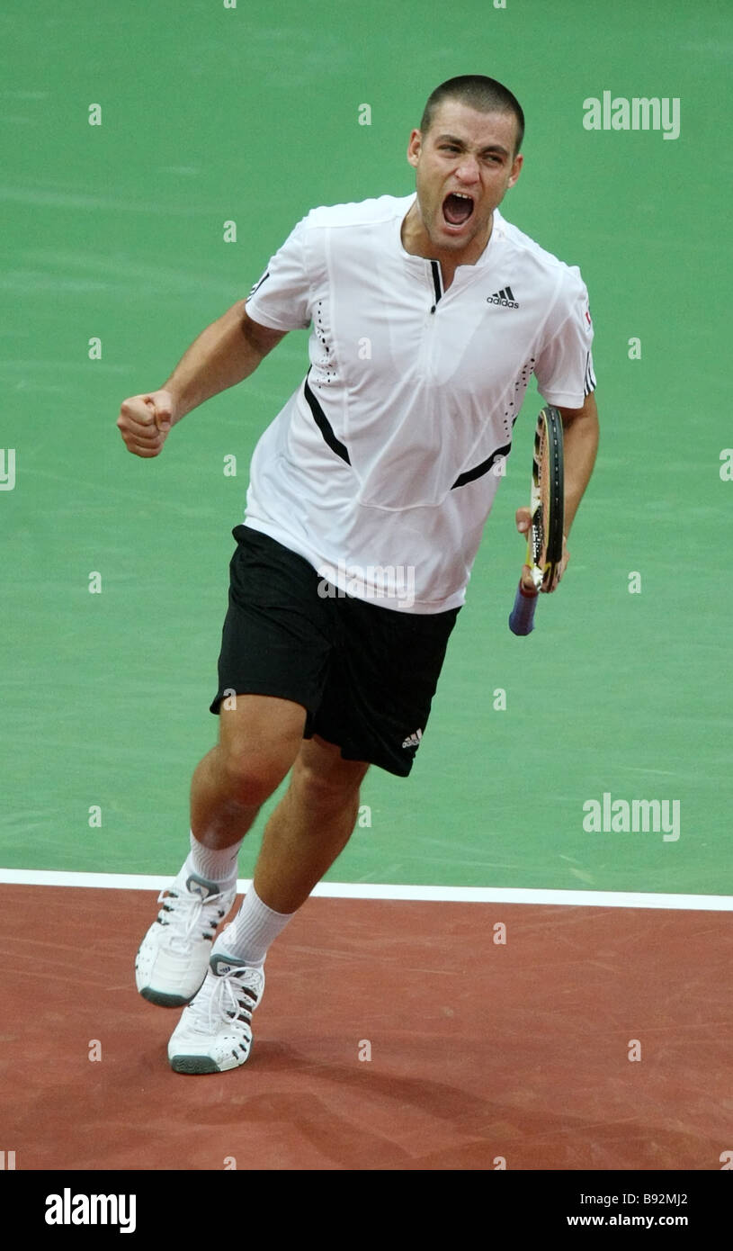 Russian Tennis Player Mikhail Youzhny During A Match With Serbian ...