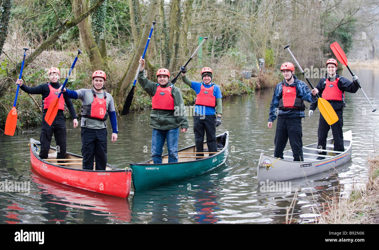 teambuilding outdoor activity adventure in canoes. Stock Photo