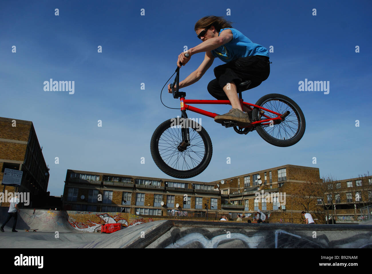 Man jumping with bike at Brixton playground Stock Photo