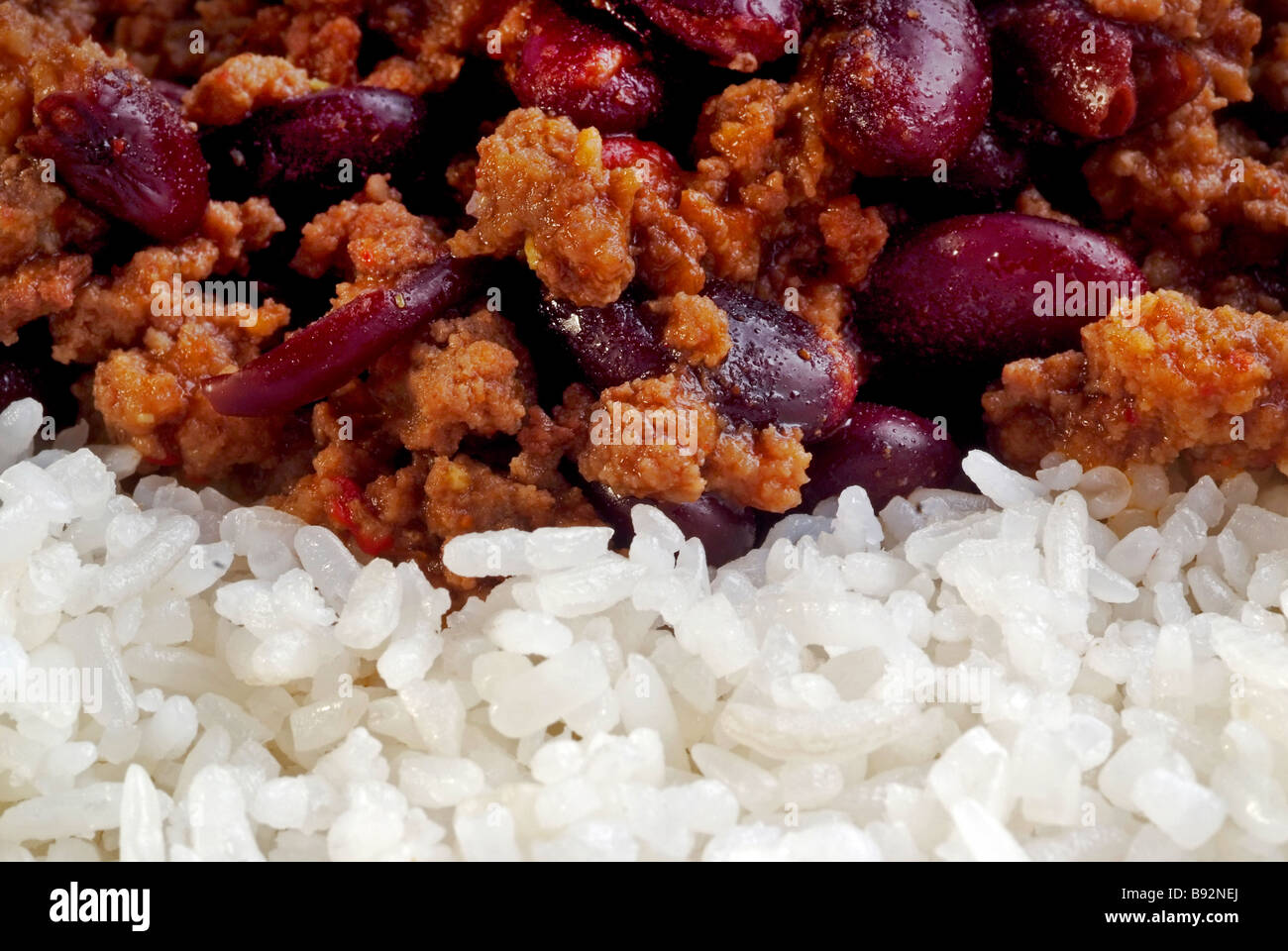 Close up of Chili Con Carne minced meat with beans and white rice Stock