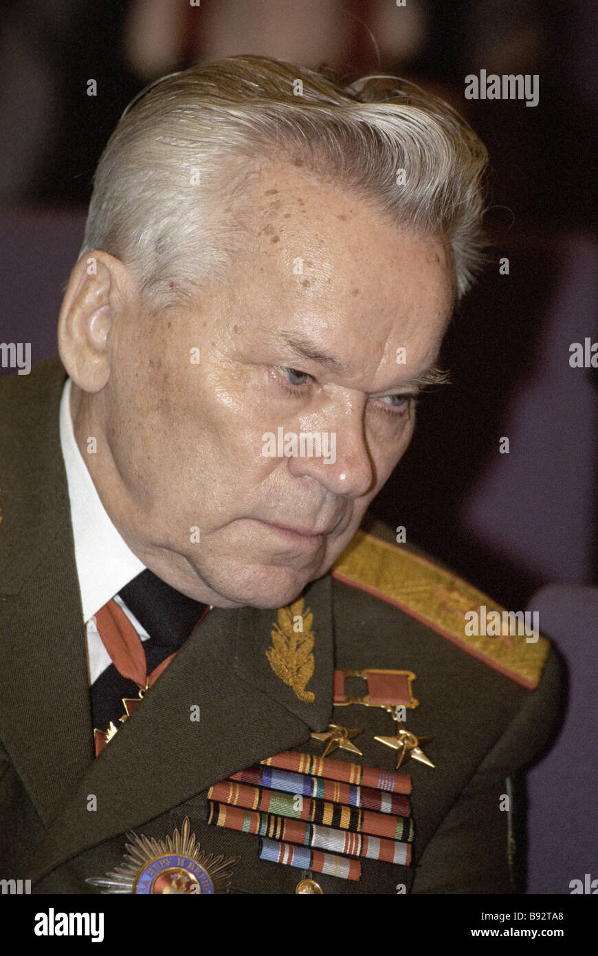 Mikhail Kalashnikov designer of small arms attending national Peter the