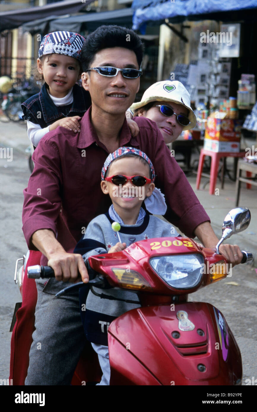 Vietnamese Motorcycle Rider Vietnamese people riding a motorcycle hi-res stock photography and ...