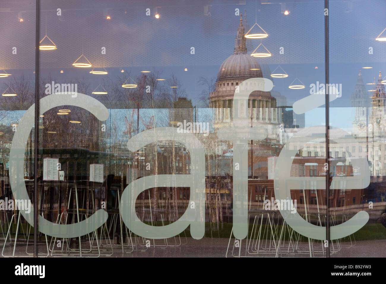Cafe & St Pauls reflection outside Tate Modern London UK Stock Photo
