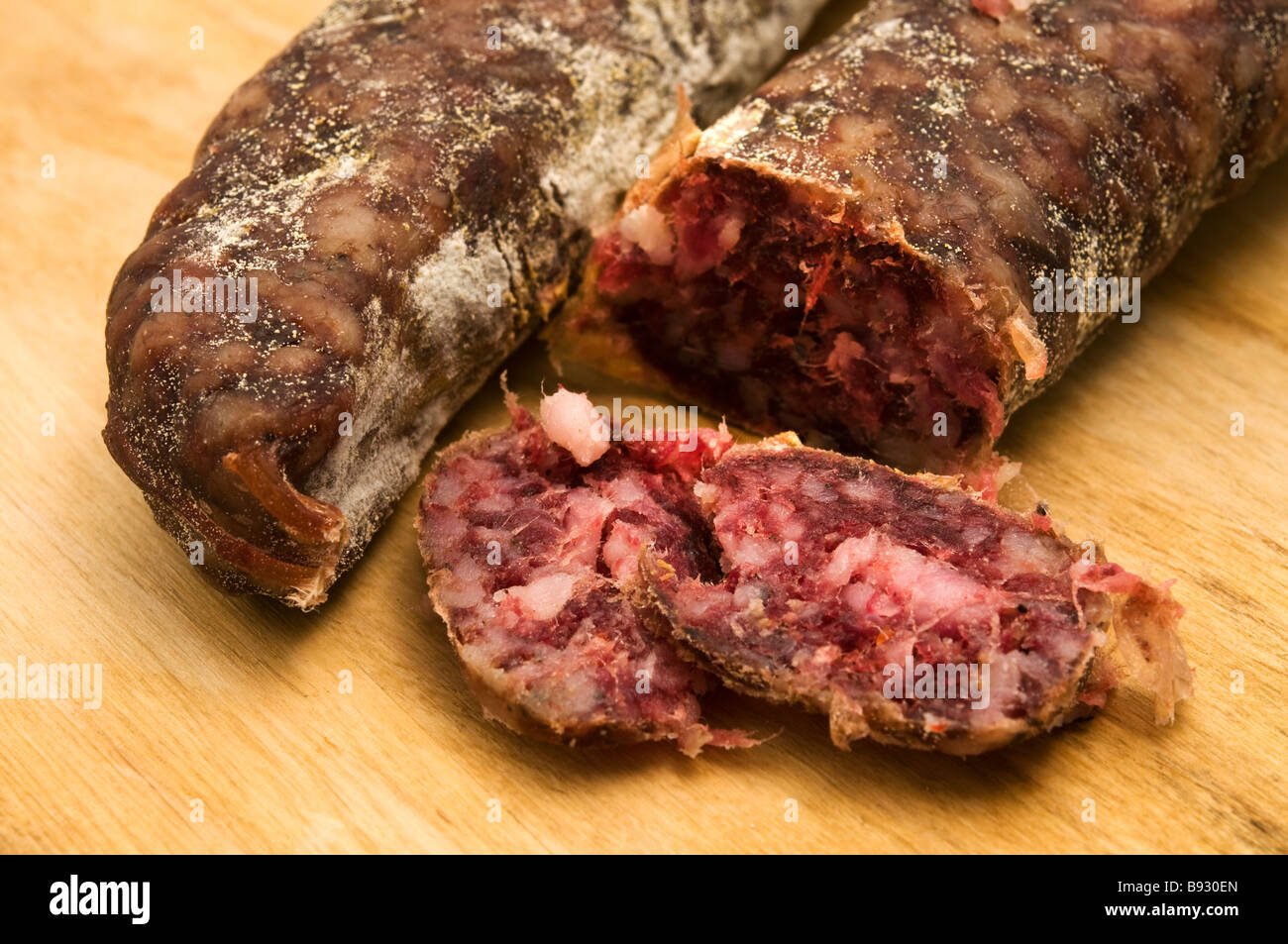 Slice of home made salami Stock Photo