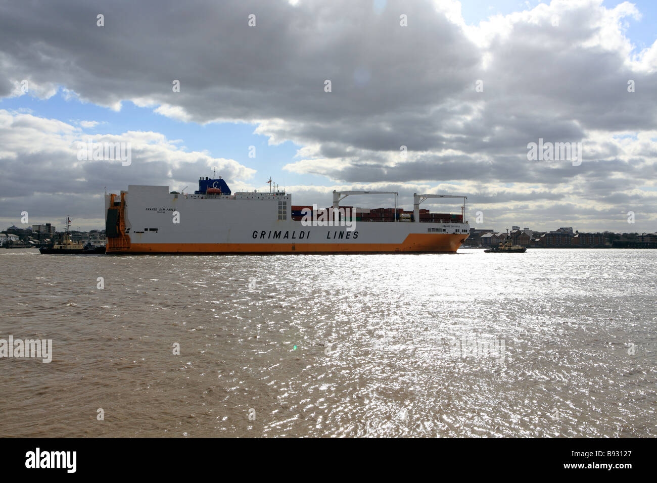 united kingdom kent gravesend a fully laden container ship travelling up the river thames to tilbury Stock Photo